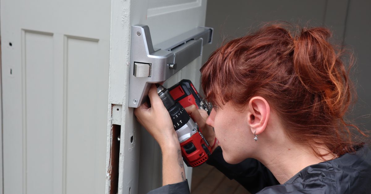 locksmith unlocking front door — North York Key Guard Locksmiths